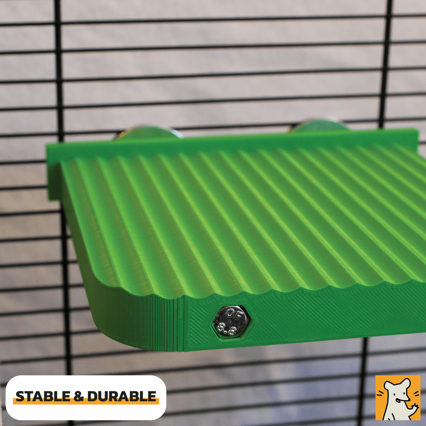 Close-up of a green 3D printed rat cage platform with textured surface, designed for stability and durability.