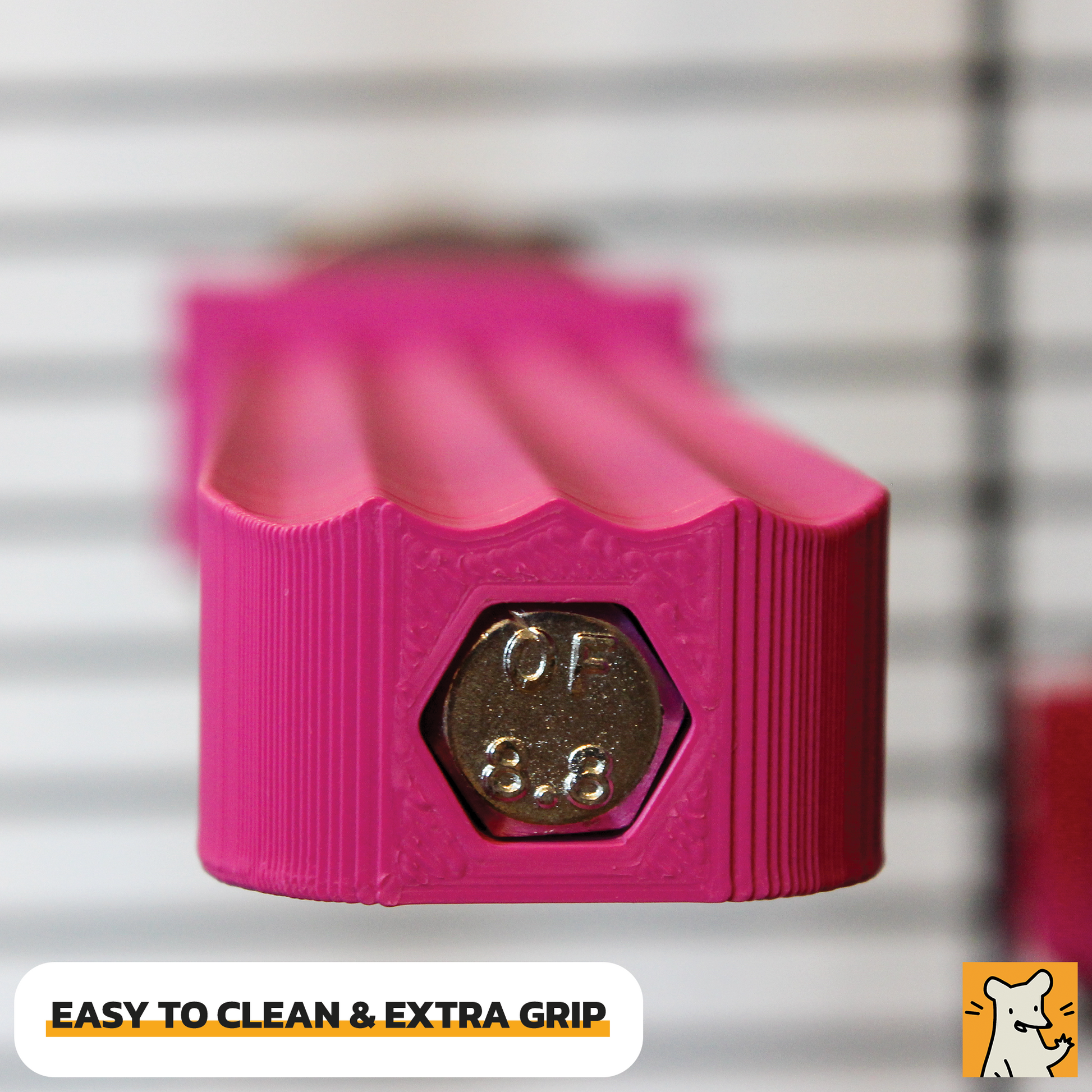Close-up of a vibrant pink rat cage ledge, featuring extra grip and easy-to-clean design.
