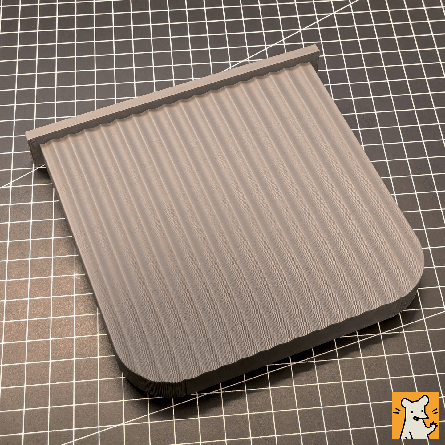 QuickSwap replacement part showing a 3D printed large platform with ribbed texture on a grid background.