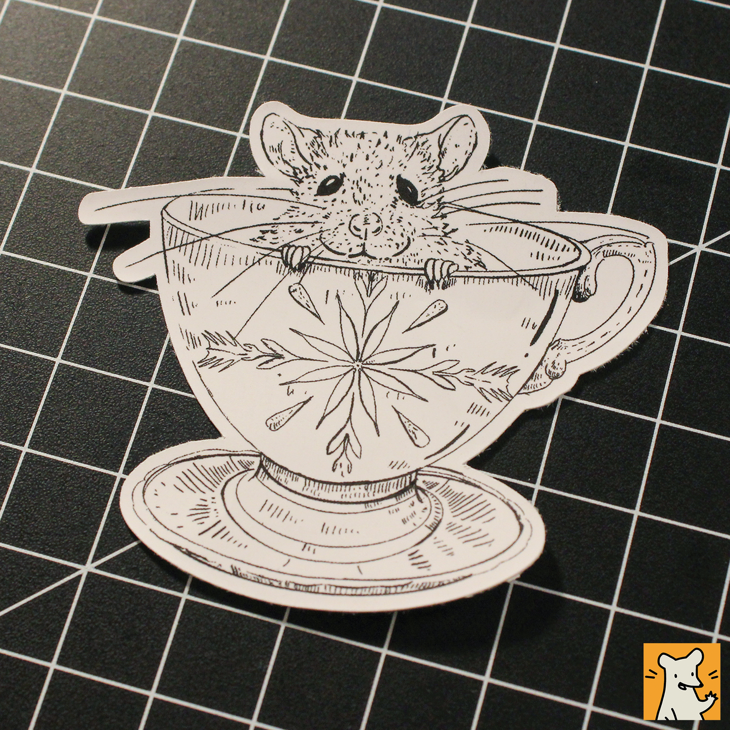 Hand-illustrated baby rat sticker peeking out of a decorative cup, ideal for laptops and craft projects.