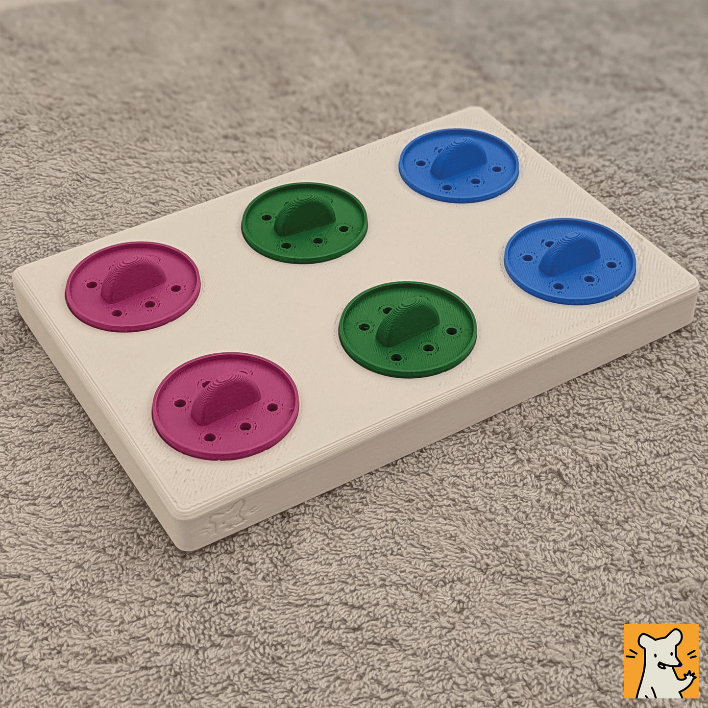 Large foraging puzzle toy with six colorful removable lids for small pets like rats and rabbits.