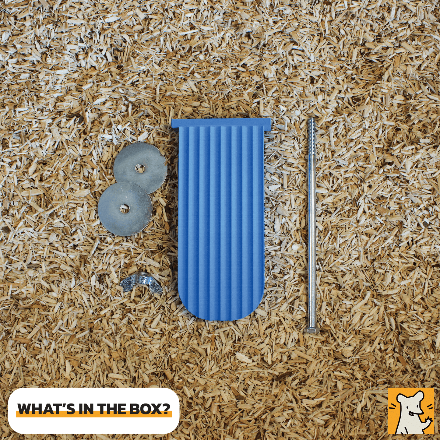 Contents of the box for a medium rat cage platform including parts and accessories on bedding material.