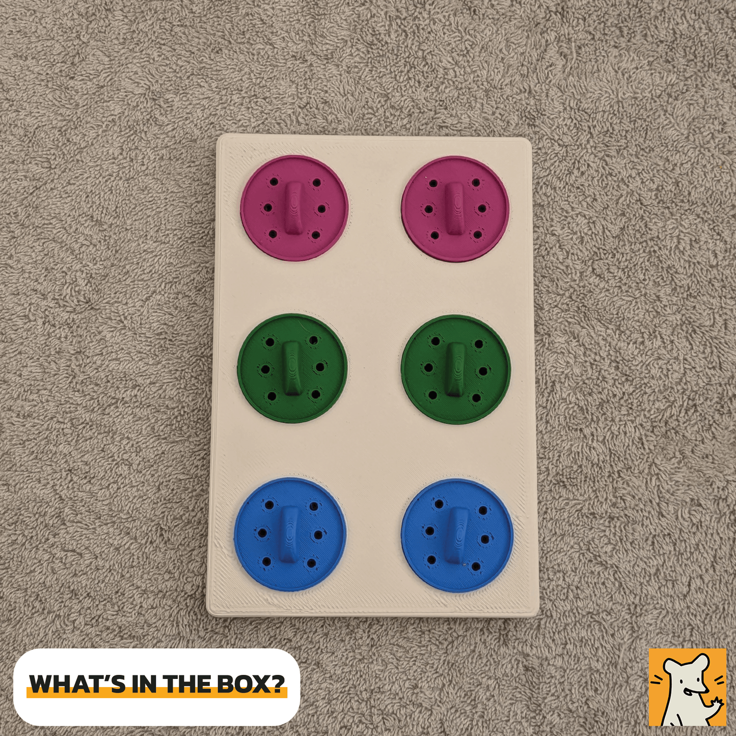 Large foraging puzzle toy featuring colorful removable treat lids for small pets stimulation.