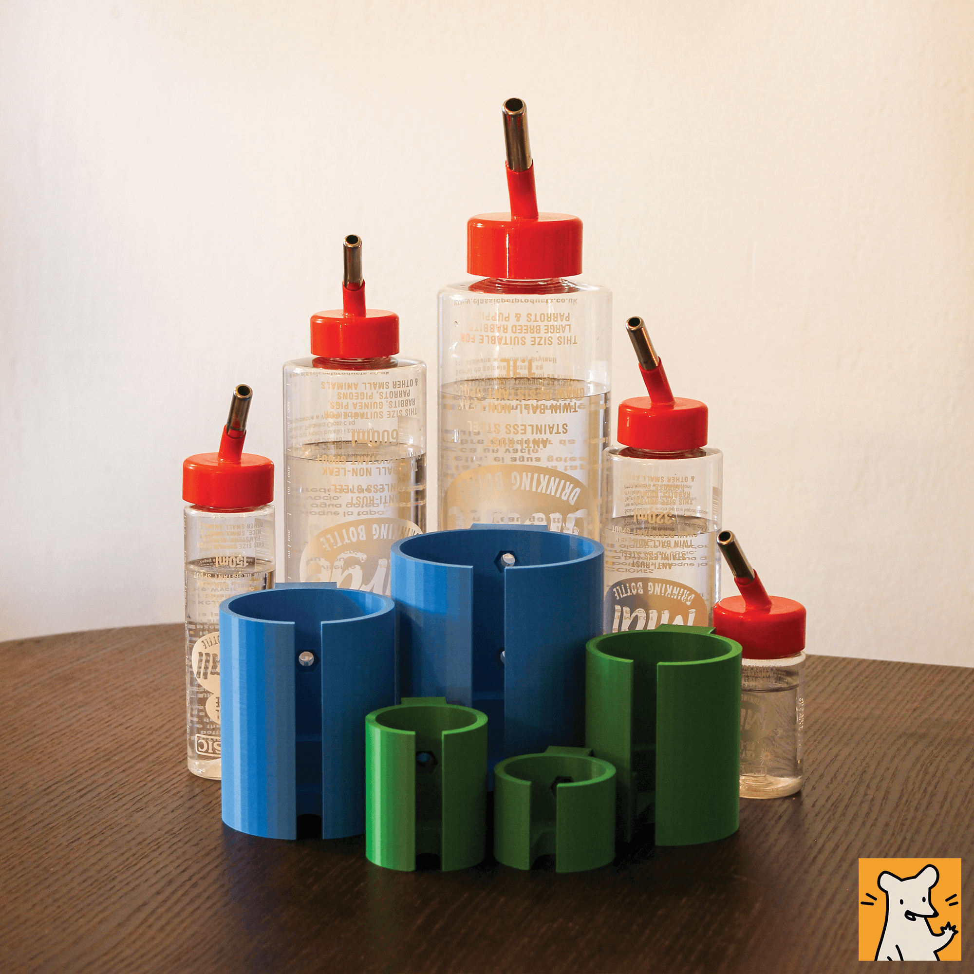 Classic Crystal Deluxe water bottle holders in blue and green, paired with multiple pet water bottles with red tops.