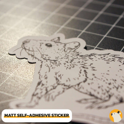 close up of 3 centimeter hand drawn matt ink rat designer sticker